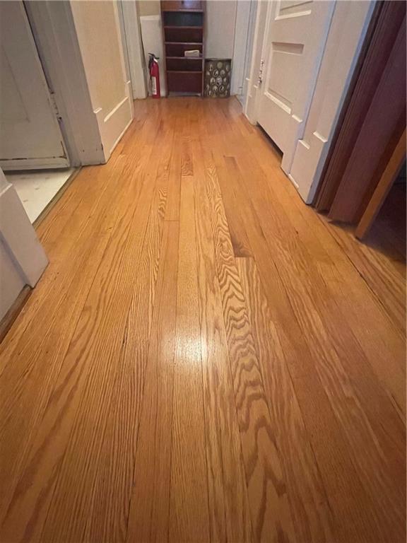 233 East Pine Street Grove City, PA 16127 - Photo 19 of 26 a view of empty room with wooden floor and fan