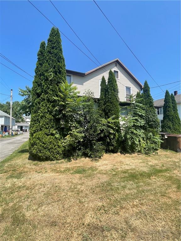 233 East Pine Street Grove City, PA 16127 - Photo 2 of 26 a backyard of a house with lots of green space