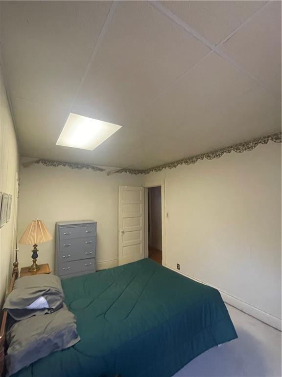 233 East Pine Street Grove City, PA 16127 - Photo 26 of 26 a bedroom with a bed and a window