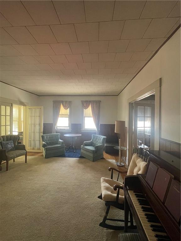 233 East Pine Street Grove City, PA 16127 - Photo 4 of 26 a living room with furniture a window and a lamp