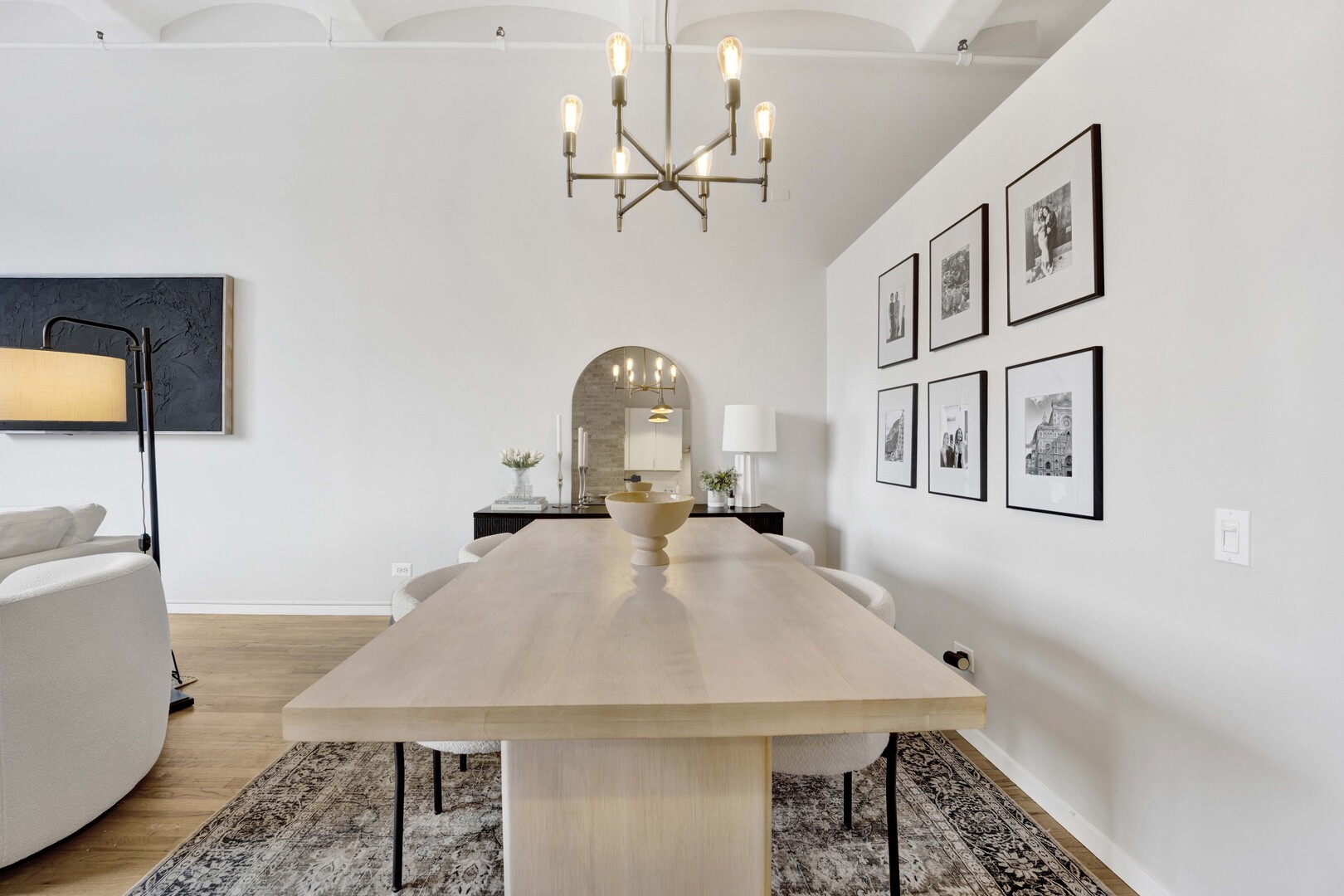 1000 West Washington Boulevard, Unit 305 Chicago, IL 60607 - Photo 8 of 21 a view of a dining room with furniture and a chandelier