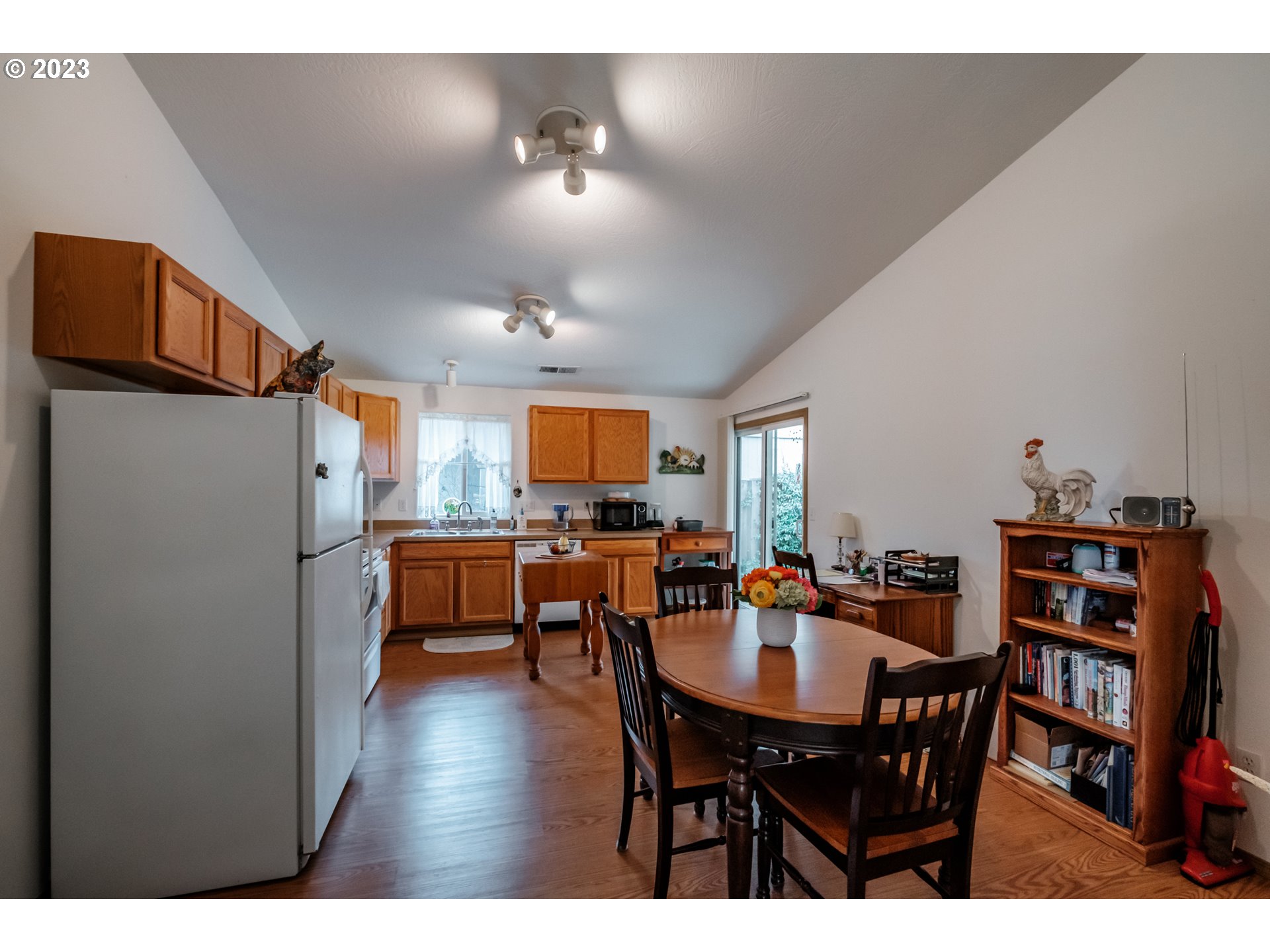 1329 Briar Road Independence, OR 97351 - Photo 16 of 27 a view of a dining room with furniture and wooden floor