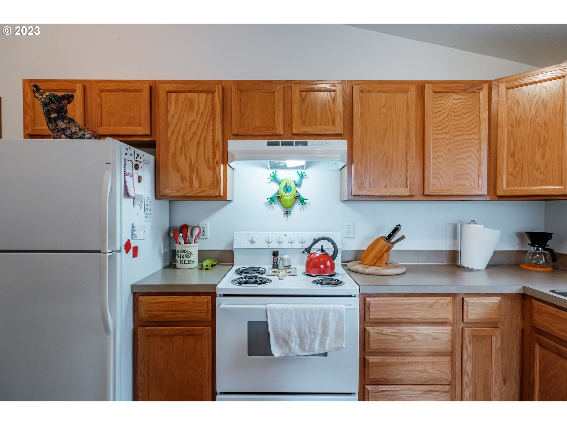 1329 Briar Road Independence, OR 97351 - Photo 19 of 27 a kitchen with stainless steel appliances granite countertop a refrigerator and a sink