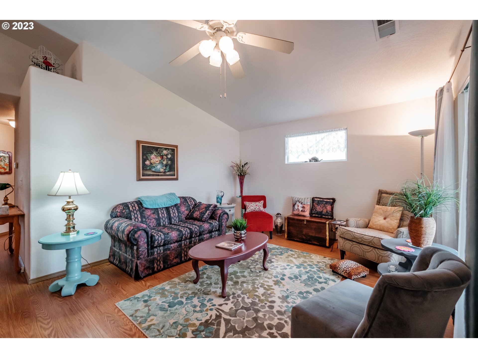 1329 Briar Road Independence, OR 97351 - Photo 3 of 27 a living room with furniture and a chandelier