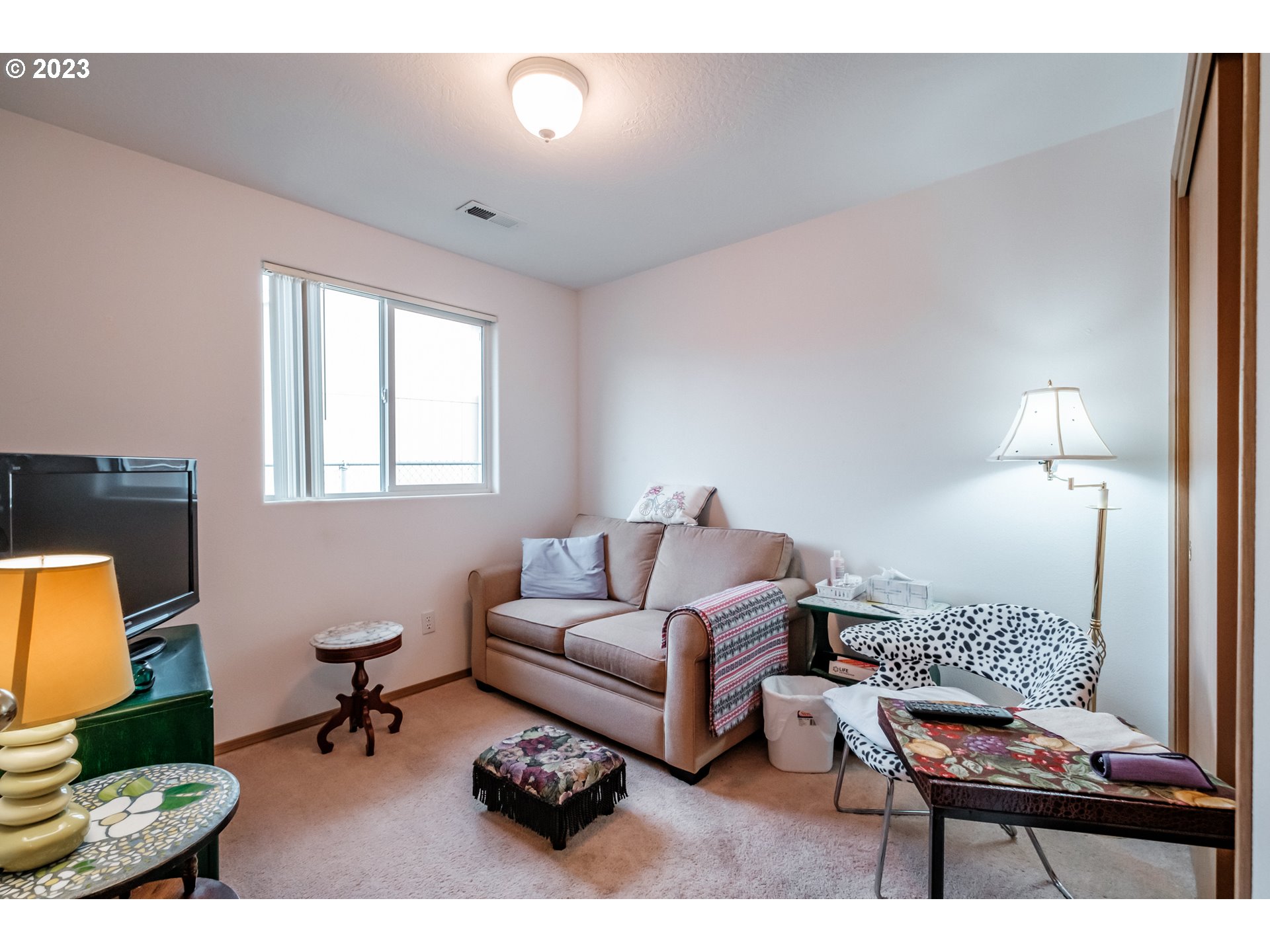 1329 Briar Road Independence, OR 97351 - Photo 6 of 27 a living room with furniture and a lamp