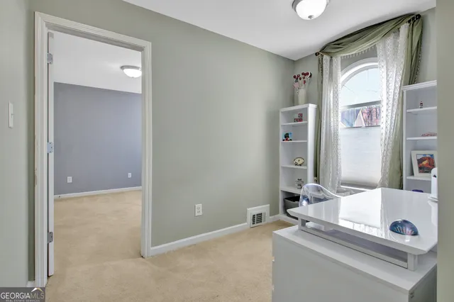 an empty room with windows