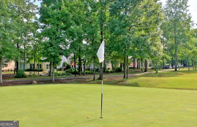 a view of an outdoor space and tennis court