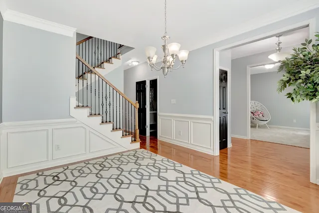 a view of entryway with flower pots