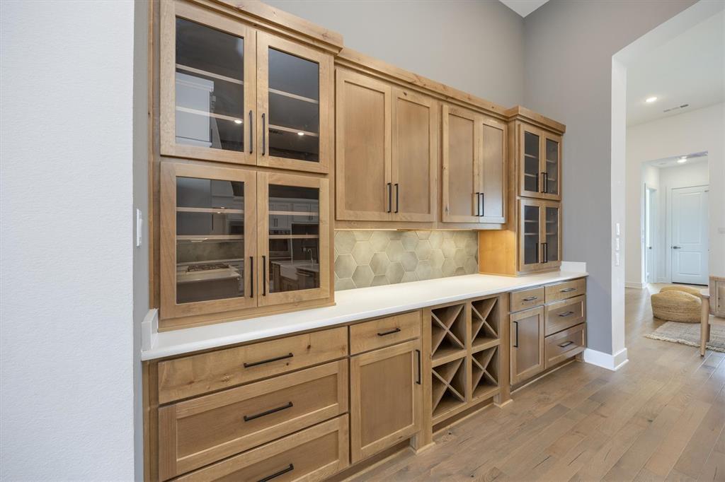 1303 Limestone Ridge Road Mansfield, TX 76063 - Photo 11 of 34 This butlers area is wonderful for serving company as well as storing your favorite wine or dishware.