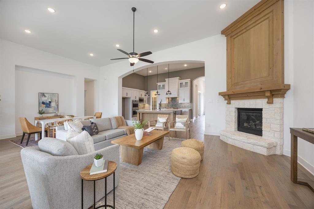 1303 Limestone Ridge Road Mansfield, TX 76063 - Photo 15 of 34 This spacious room shares the open space with the kitchen and dining. Slide open the patio doors on a cool spring evening!