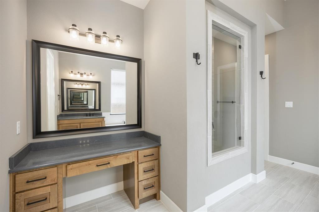 1303 Limestone Ridge Road Mansfield, TX 76063 - Photo 21 of 34 Enjoy a separate makeup vanity while getting ready!