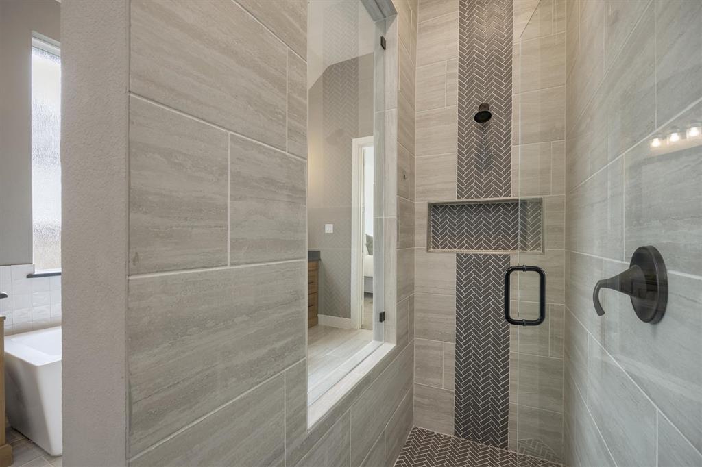 1303 Limestone Ridge Road Mansfield, TX 76063 - Photo 22 of 34 The shower is quite spacious!