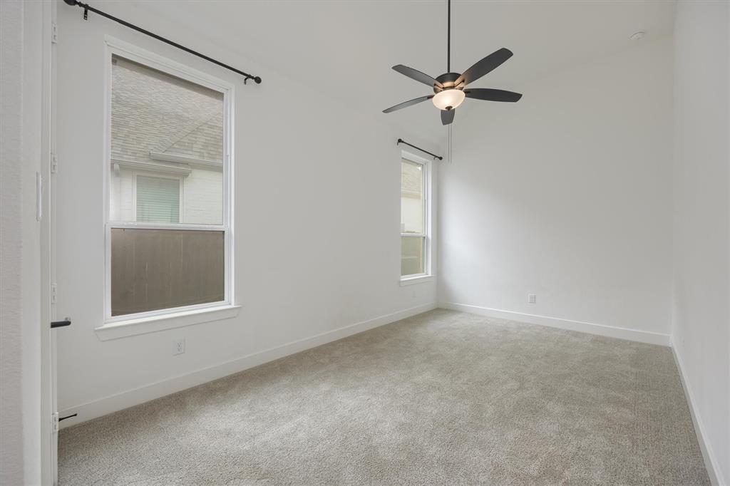 1303 Limestone Ridge Road Mansfield, TX 76063 - Photo 25 of 34 Spacious bedroom could be used as an office if 4th bedroom is not needed. This bedroom also utilizes a private bath located in the hallway.