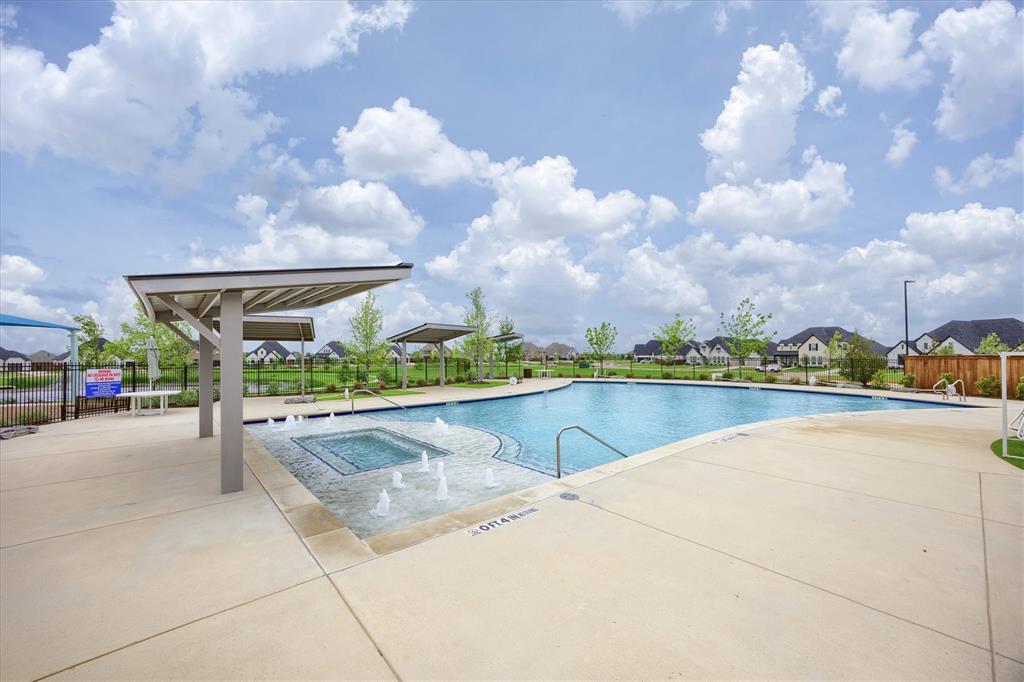 1303 Limestone Ridge Road Mansfield, TX 76063 - Photo 30 of 34 Imagine taking the kids to the pool in the summer or diving in with your friends!