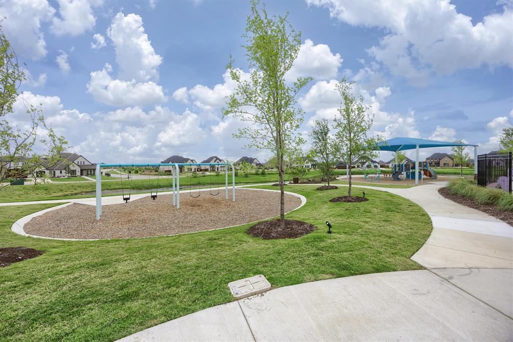 1303 Limestone Ridge Road Mansfield, TX 76063 - Photo 33 of 34 The community park is perfect for fun with the kids!.