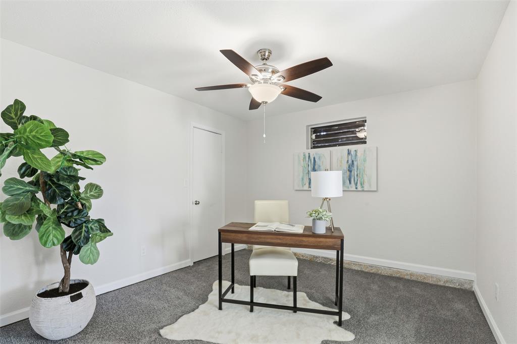 2212 Briardale Road Fort Worth, TX 76119 - Photo 12 of 25 a living room with furniture and a potted plant
