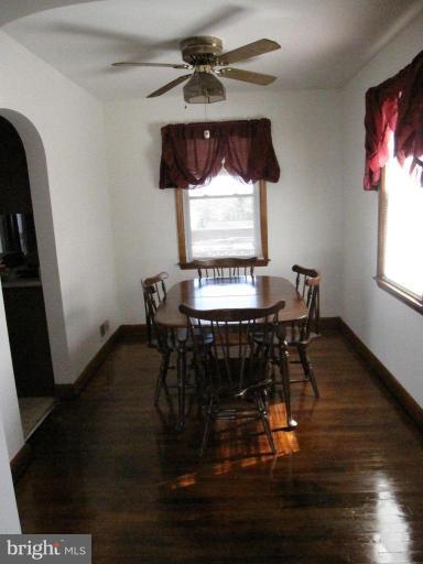 7917 34th Street Rosedale, MD 21237 - Photo 14 of 23 a workspace with furniture window and wooden floor