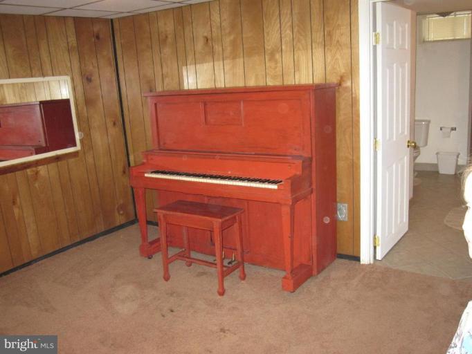 7917 34th Street Rosedale, MD 21237 - Photo 15 of 23 a room with a chair and a window