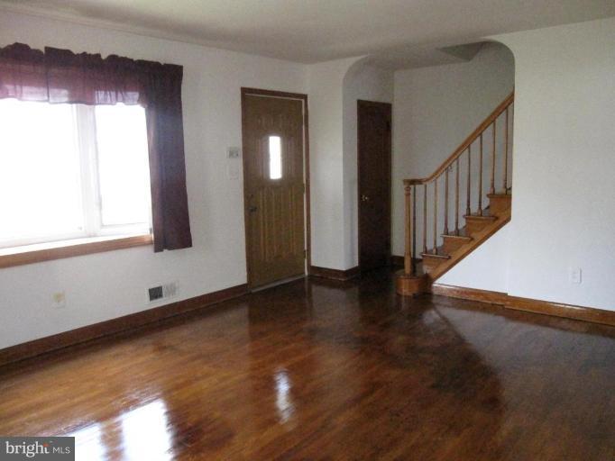 7917 34th Street Rosedale, MD 21237 - Photo 17 of 23 a view of an entryway with wooden floor