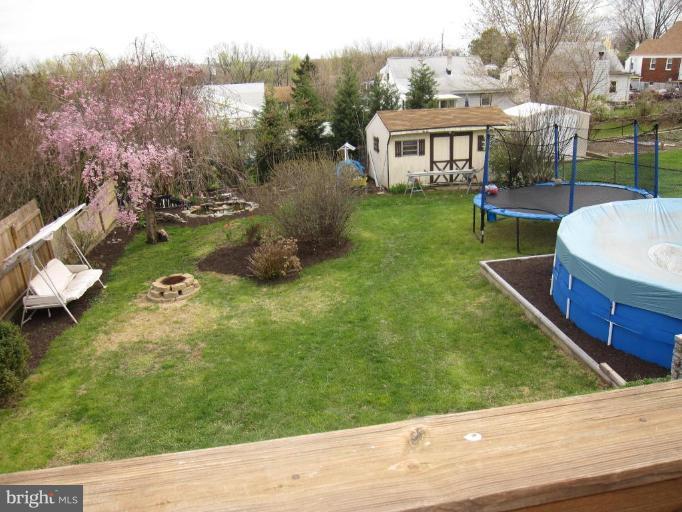 7917 34th Street Rosedale, MD 21237 - Photo 6 of 23 a swimming pool with outdoor seating and yard