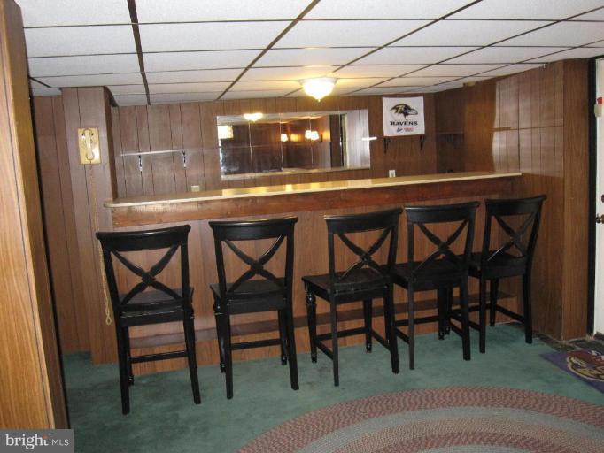 7917 34th Street Rosedale, MD 21237 - Photo 9 of 23 a dining area with chairs and table