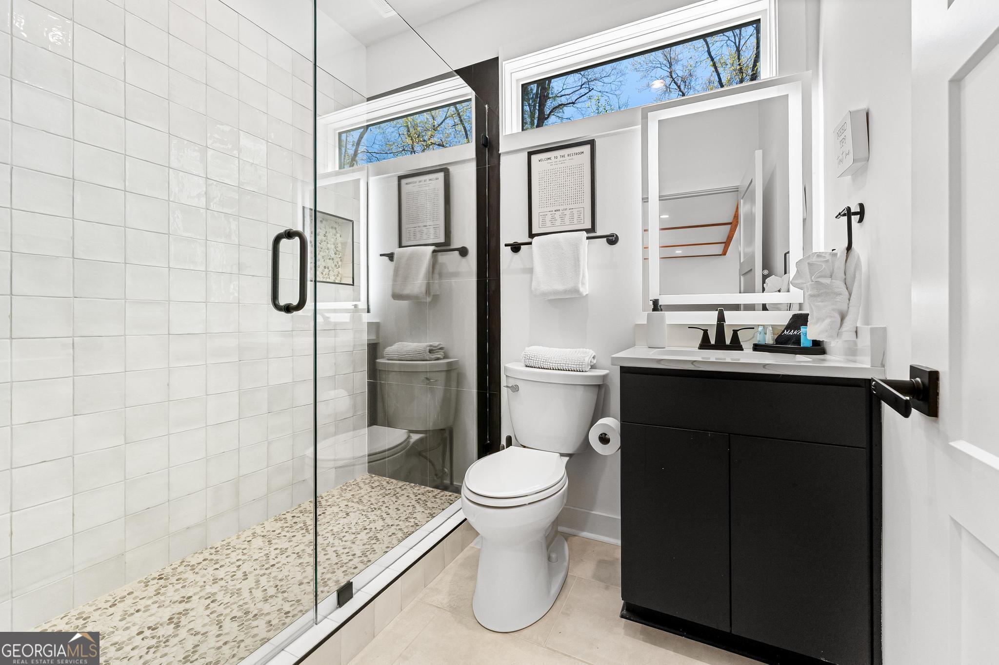 150 Clarice Lane Sautee Nacoochee, GA 30571 - Photo 11 of 42 a bathroom with a sink a toilet and shower