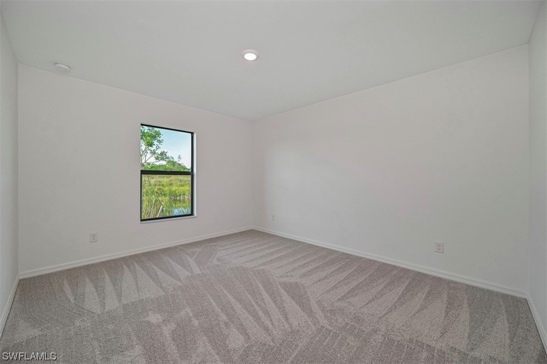 830 General Chesty Puller Court LaBelle, FL 33935 - Photo 12 of 21 an empty room with a window