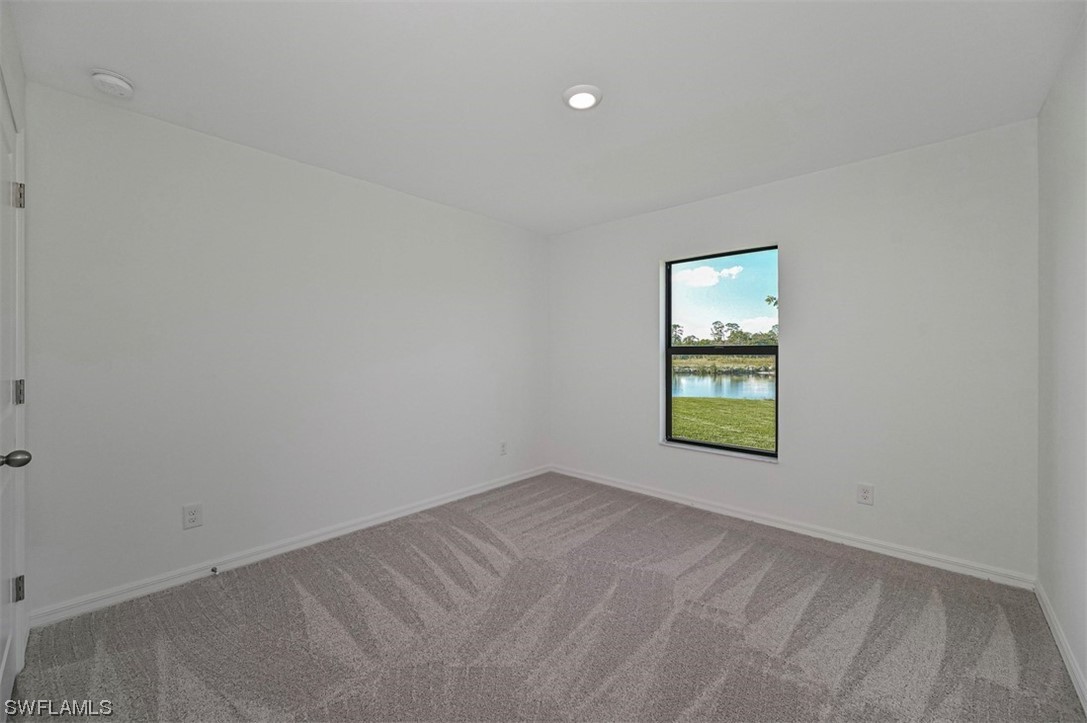 830 General Chesty Puller Court LaBelle, FL 33935 - Photo 16 of 21 an empty room with windows