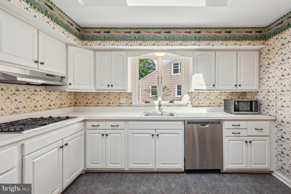 2 Wagon Bridge Run Moorestown, NJ 08057 - Photo 14 of 23 a kitchen with white cabinets and sink