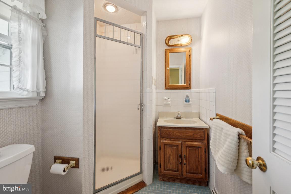 2 Wagon Bridge Run Moorestown, NJ 08057 - Photo 15 of 23 a bathroom with a sink a toilet and mirror