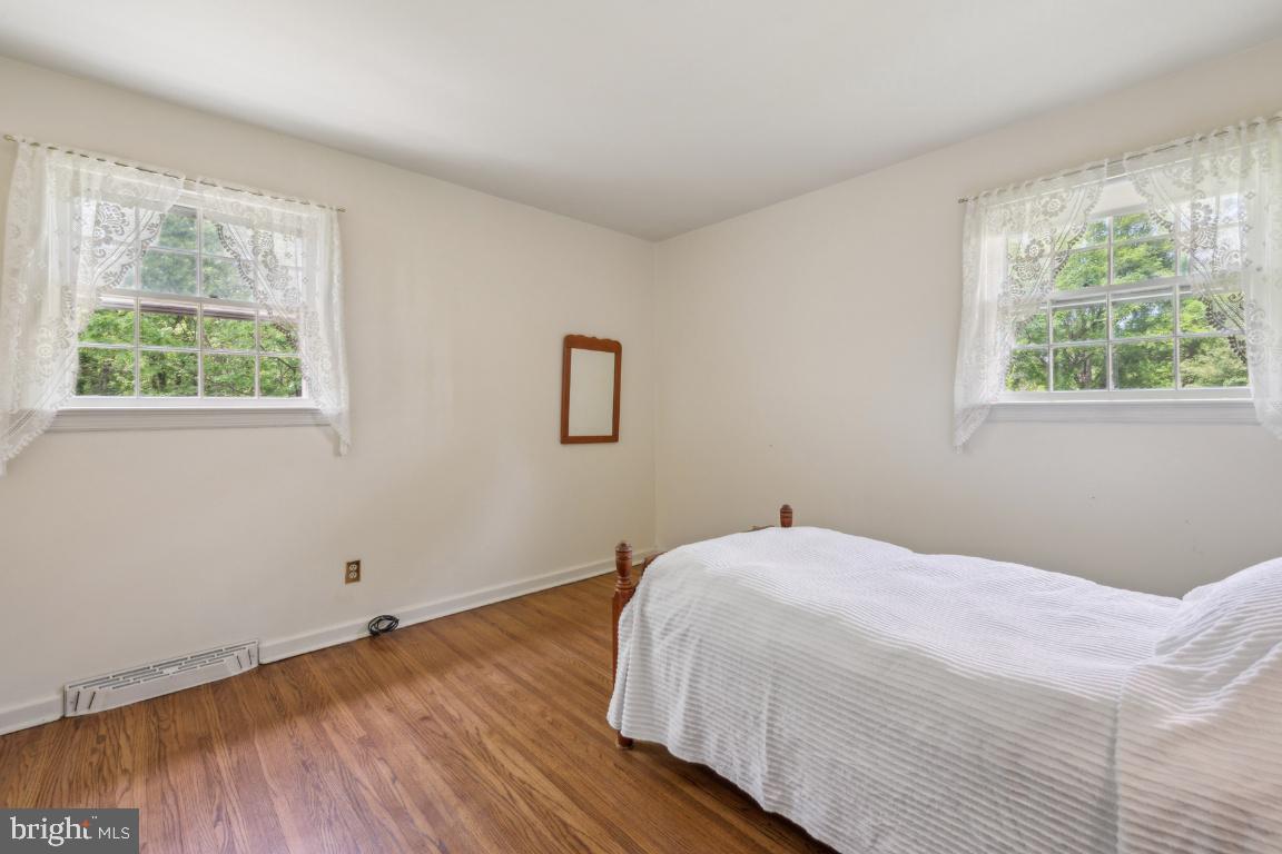 2 Wagon Bridge Run Moorestown, NJ 08057 - Photo 18 of 23 a bedroom with a bed and a window