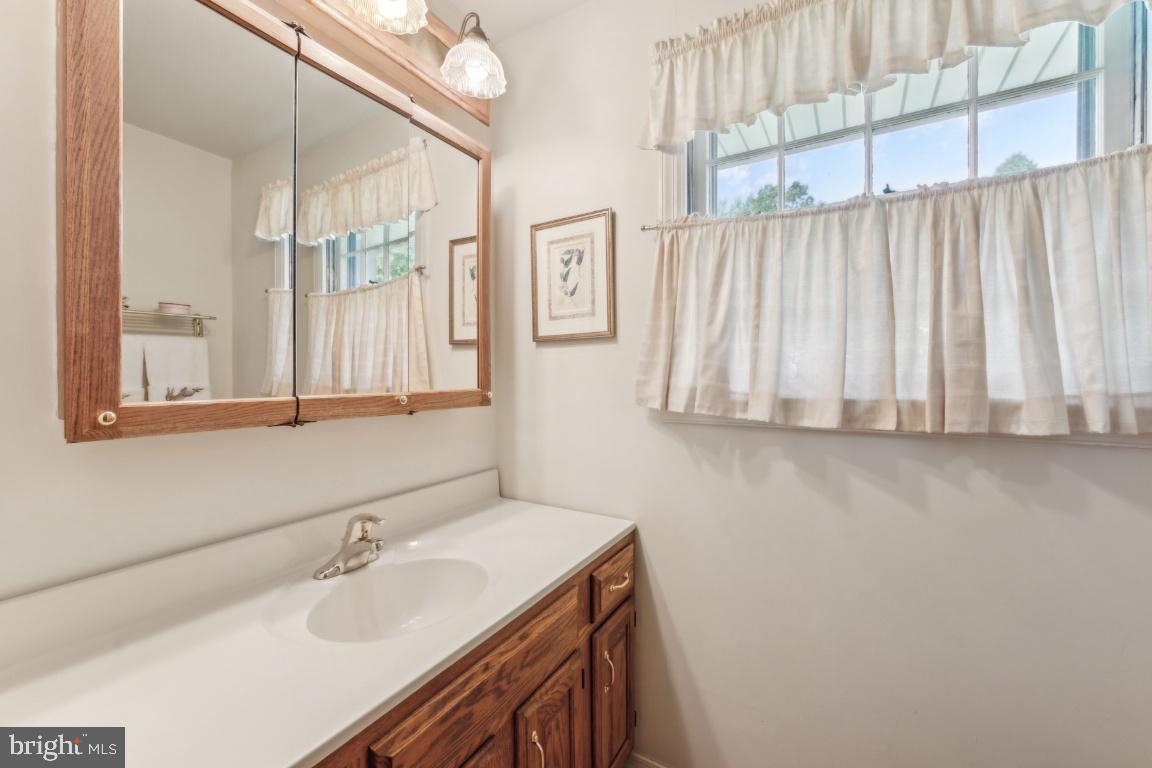 2 Wagon Bridge Run Moorestown, NJ 08057 - Photo 19 of 23 a bathroom with a sink and a mirror