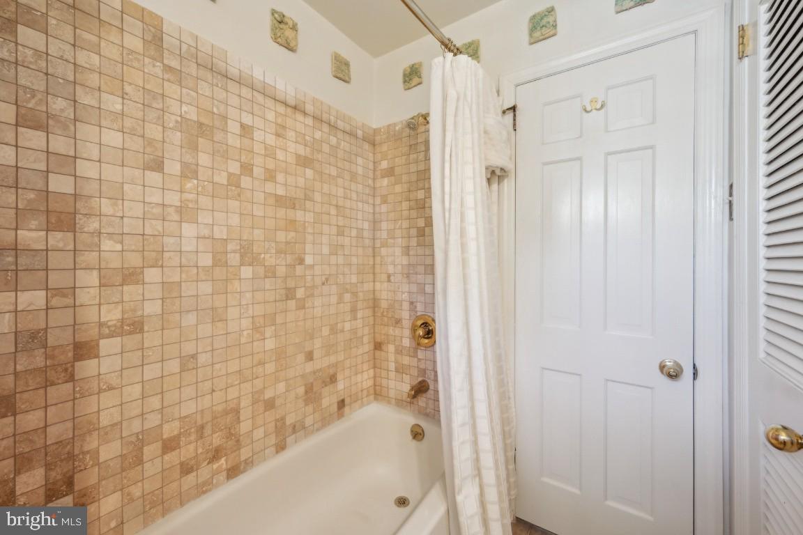 2 Wagon Bridge Run Moorestown, NJ 08057 - Photo 20 of 23 a bathroom with a shower and a bath tub
