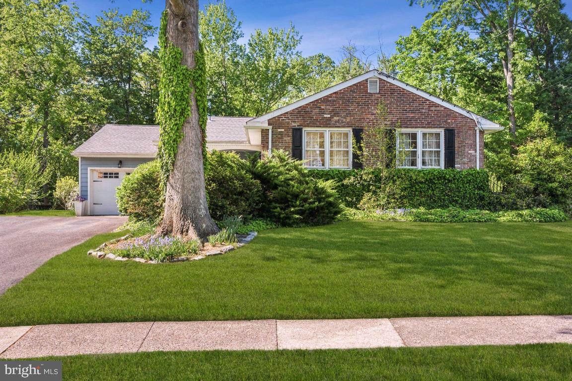 2 Wagon Bridge Run Moorestown, NJ 08057 - Photo 2 of 23 a front view of a house with a yard
