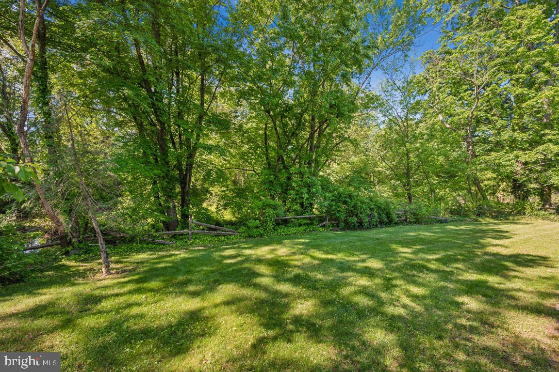 2 Wagon Bridge Run Moorestown, NJ 08057 - Photo 21 of 23 a view of a grassy field with trees in the background