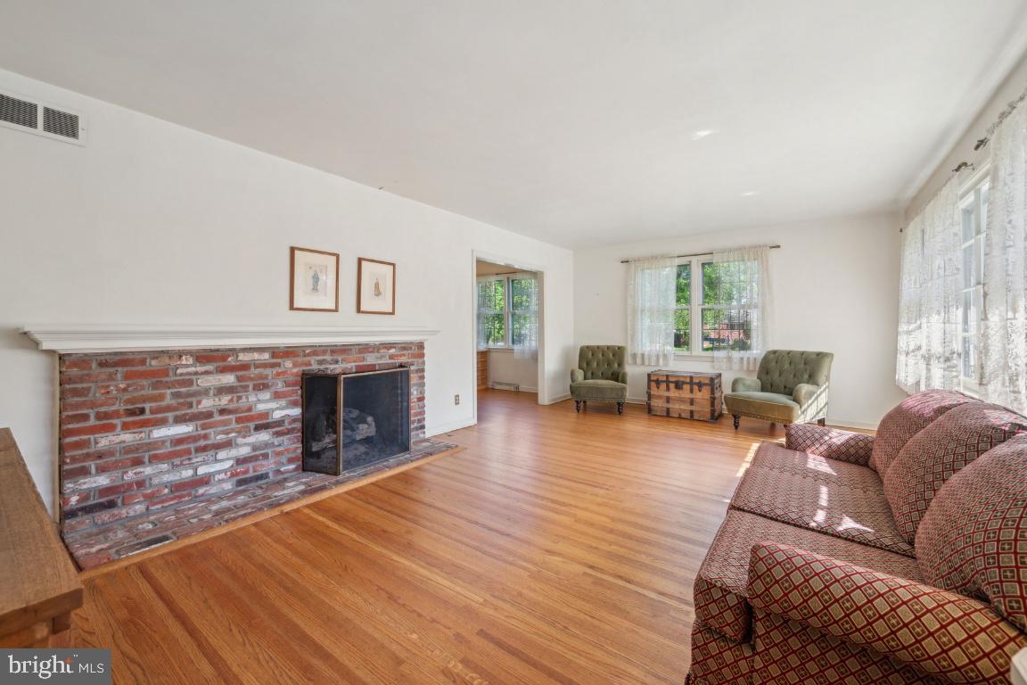 2 Wagon Bridge Run Moorestown, NJ 08057 - Photo 5 of 23 a living room with furniture and a fireplace