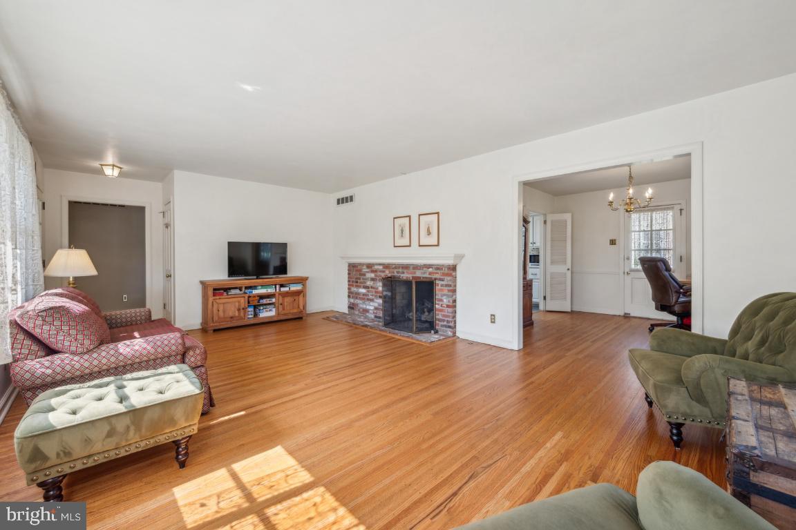 2 Wagon Bridge Run Moorestown, NJ 08057 - Photo 7 of 23 a living room with furniture and a fireplace