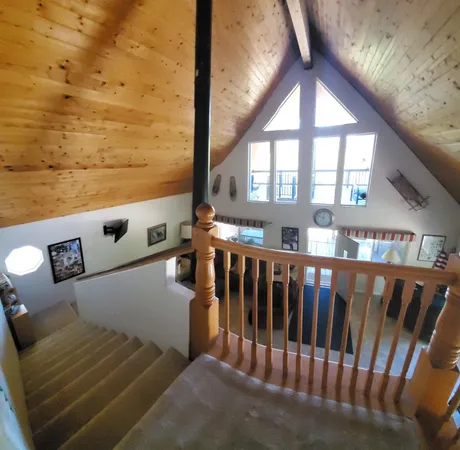 a view of balcony with furniture