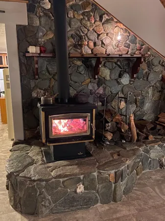 a living room with fireplace