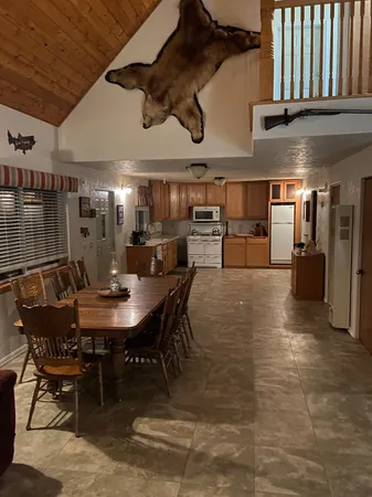 a view of a dining room with furniture