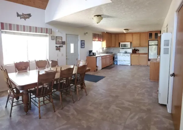 a view of a dining room with furniture