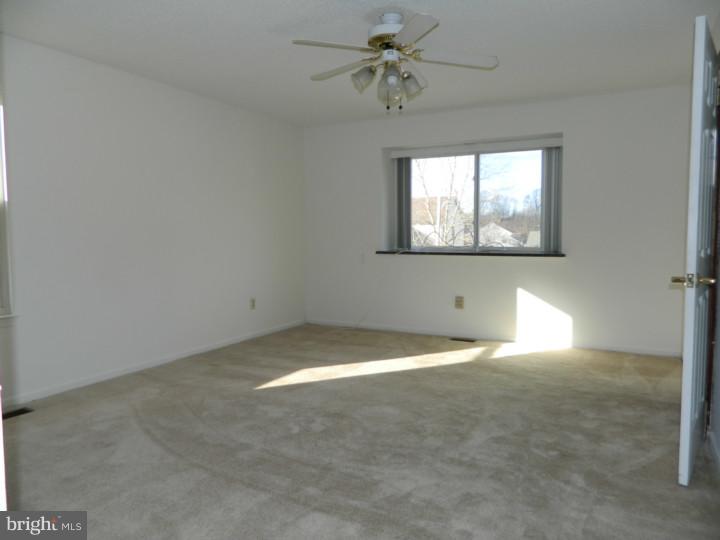 25 Blue Grass Road Clementon, NJ 08021 - Photo 13 of 25 a view of an empty room and a window