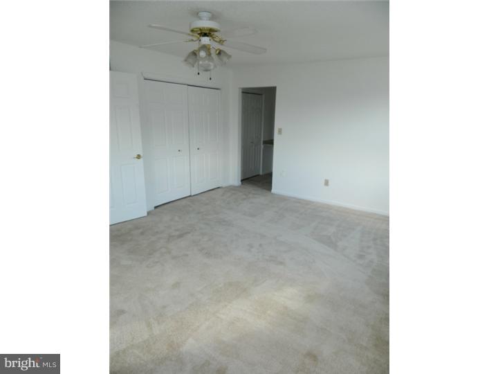 25 Blue Grass Road Clementon, NJ 08021 - Photo 14 of 25 a view of a chandelier fan in a room
