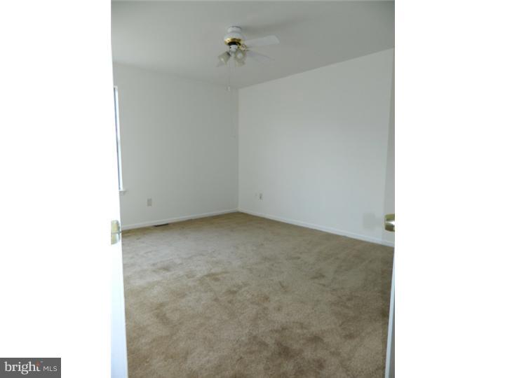 25 Blue Grass Road Clementon, NJ 08021 - Photo 15 of 25 a view of a room with a bench