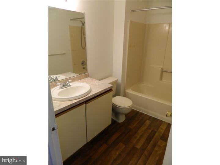 25 Blue Grass Road Clementon, NJ 08021 - Photo 19 of 25 a bathroom with a sink a toilet and shower