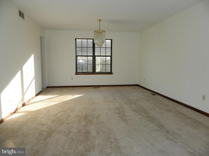 25 Blue Grass Road Clementon, NJ 08021 - Photo 9 of 25 an empty room with windows