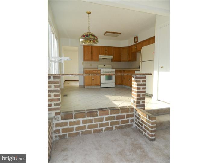 25 Blue Grass Road Clementon, NJ 08021 - Photo 10 of 25 a view of a room with shelves