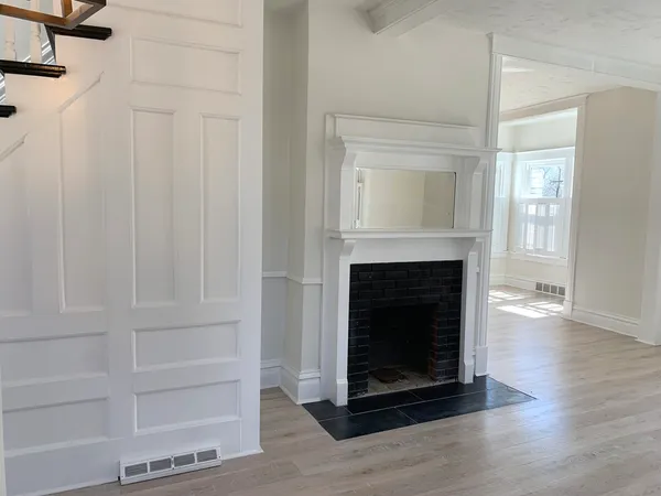 a living room with a fireplace