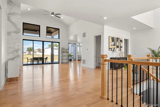 a bathroom with a sink a mirror and a shower