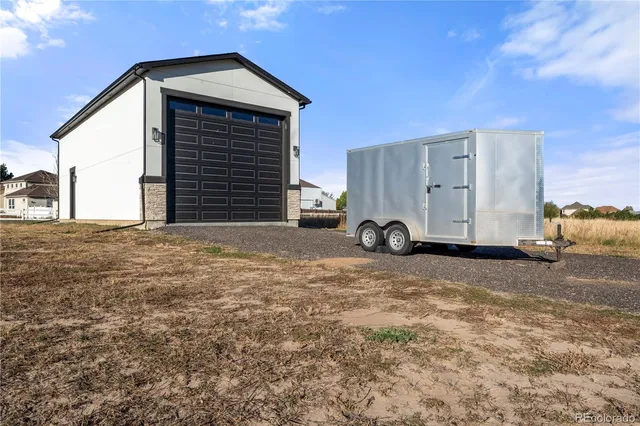 a view of a livingroom with furniture and deck
